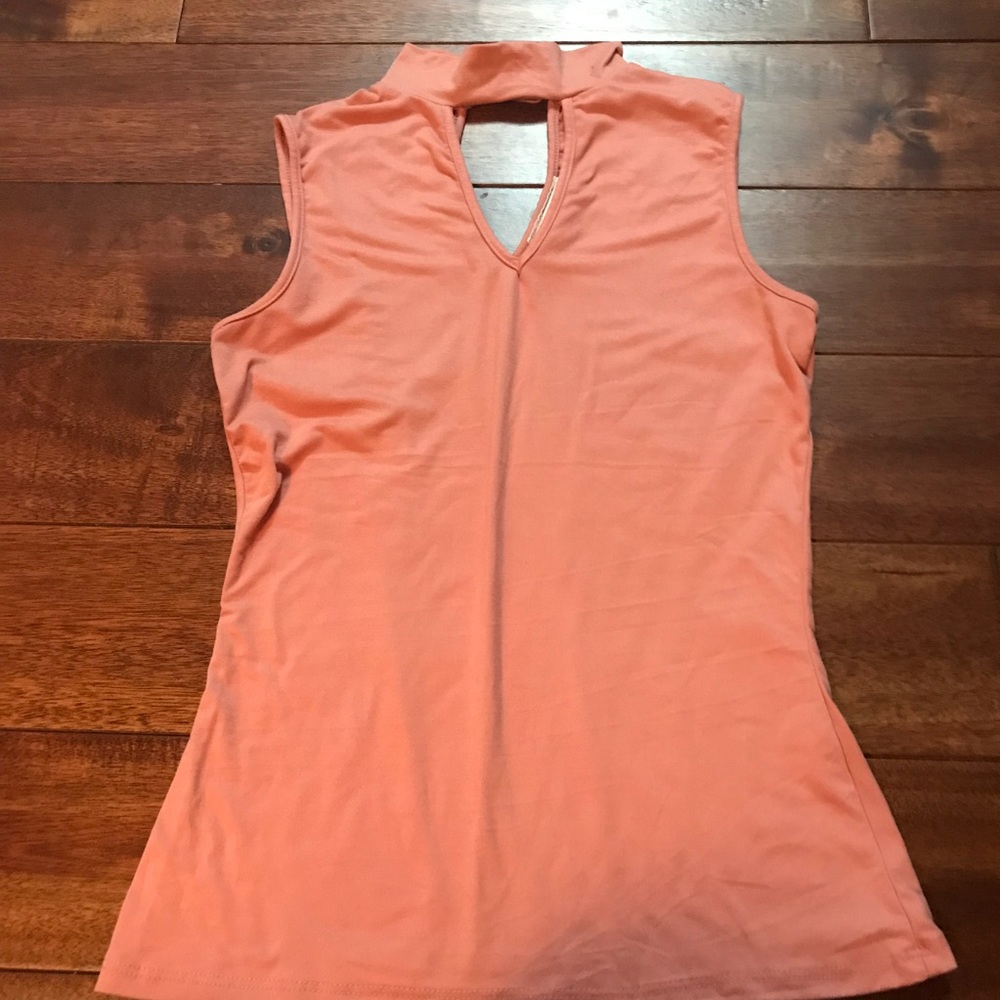 Pink top with chocked attached